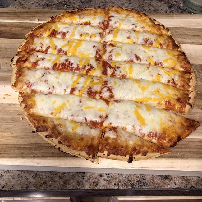 „A gyerekeim naivan azt hiszik, hogy ha így vágják fel a pizzát, akkor több lesz belőle.''